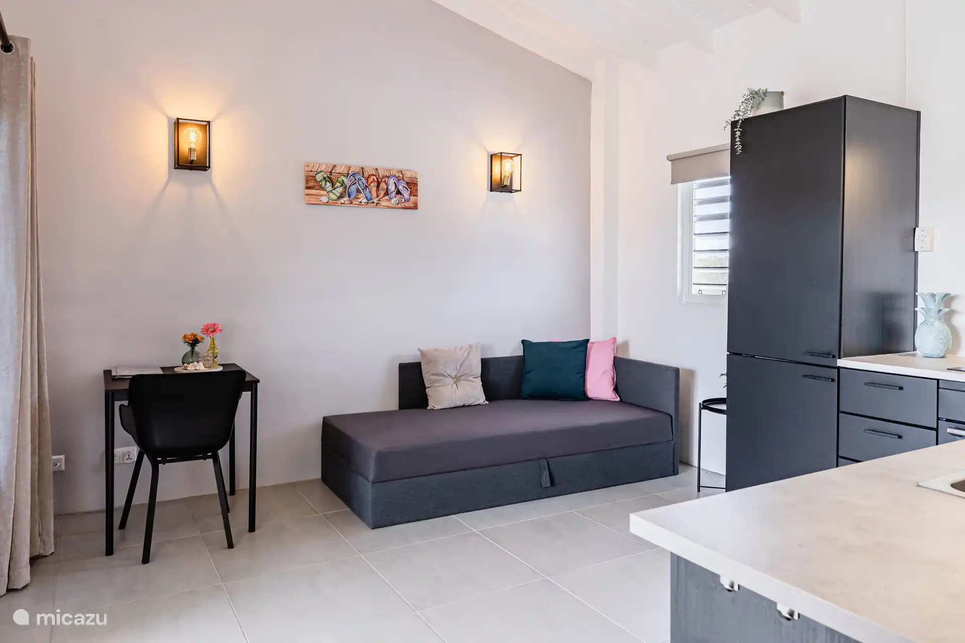 Cocina comedor con sofá cama apto para una 3ª persona