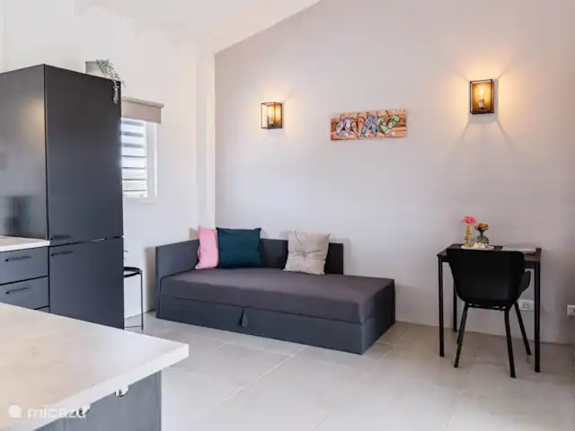 Location de Vacances Curaçao, Banda Abou (ouest), Hofi Abou, maison de vacances - Bunitesa di bida - Kas Iquana Cuisine dînatoire avec canapé-lit pouvant accueillir une 3ème personne