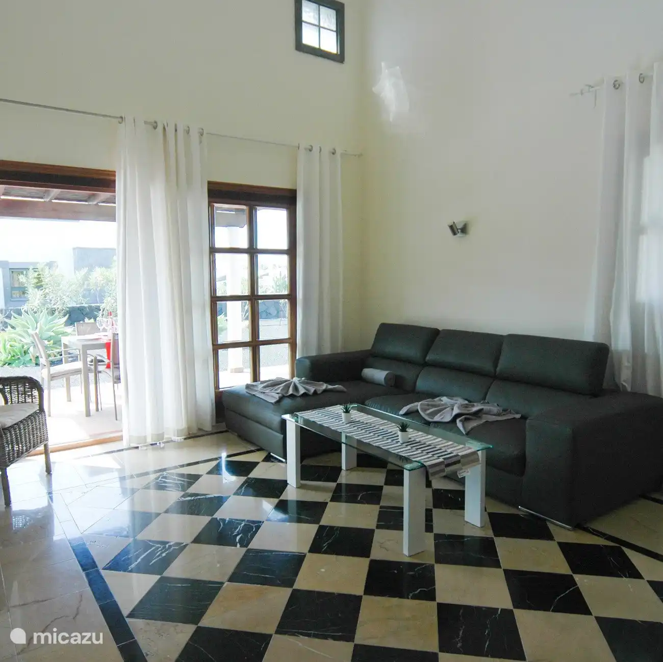The living room also has air conditioning and you have direct access to your terrace
