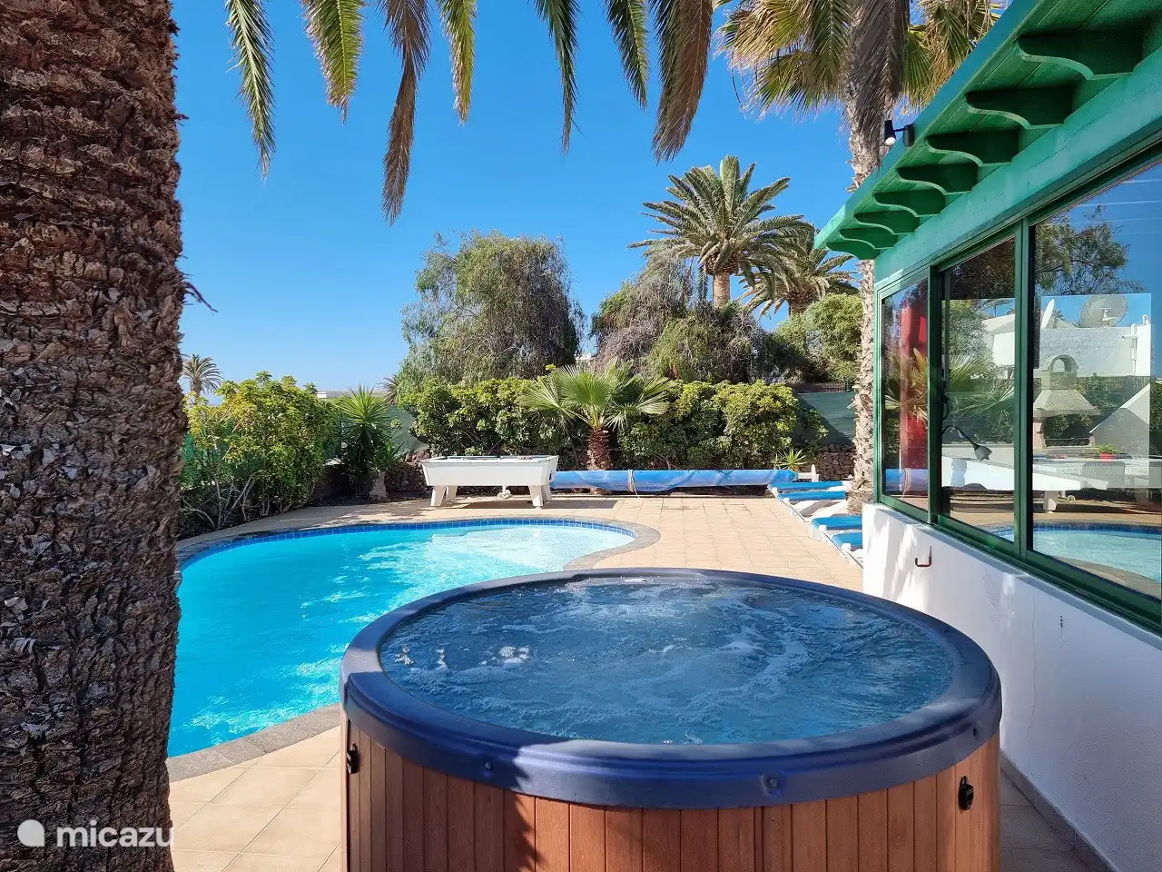 Enjoy the lovely hot tub.