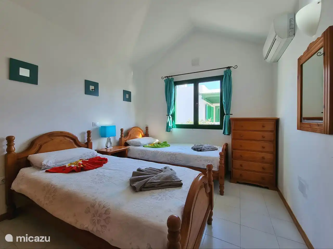 Bedroom 2 with two single beds