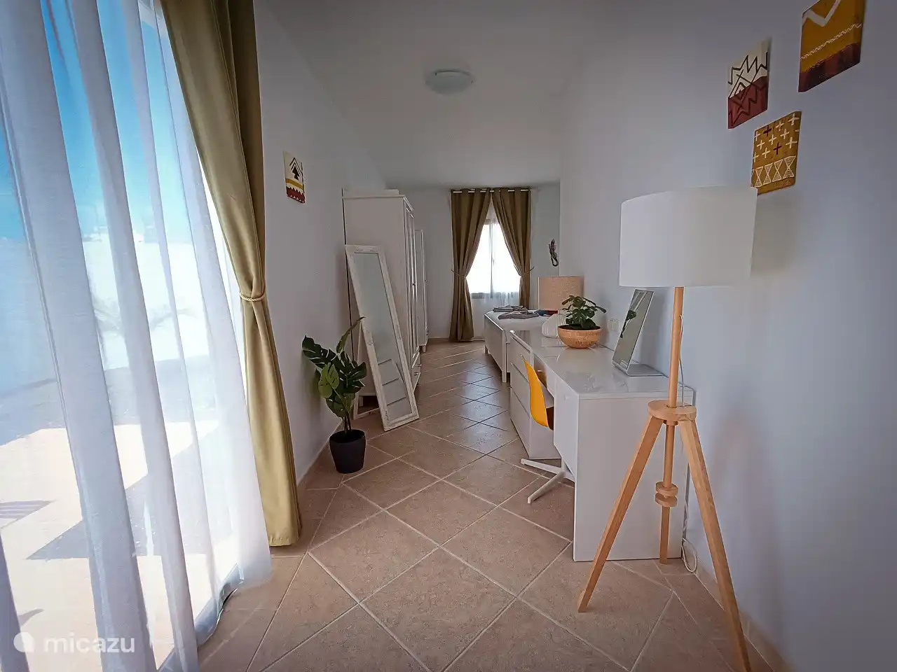 Bedroom 1 with mirror and desk