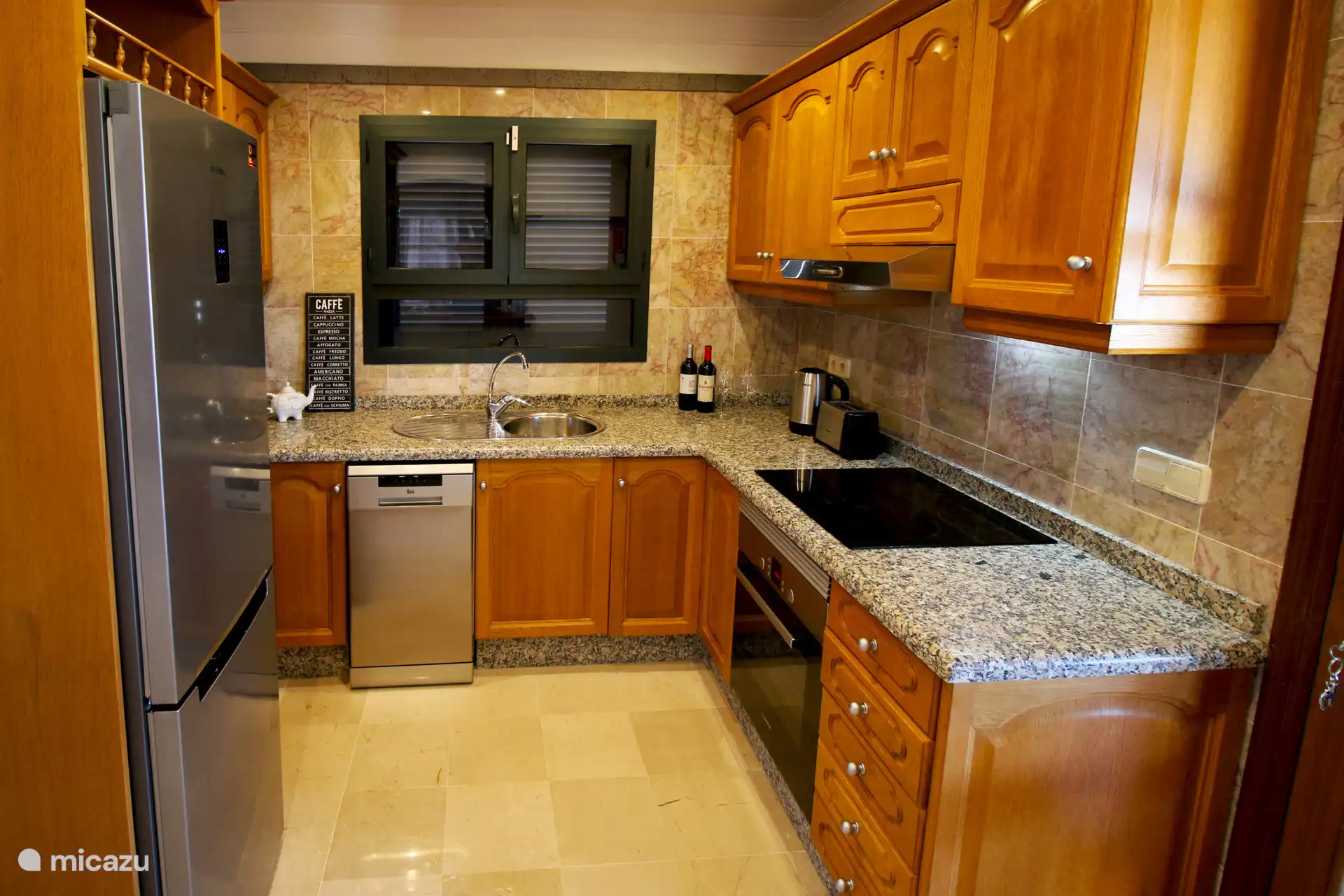 The kitchen is spacious and equipped with all the necessities you could wish for! 