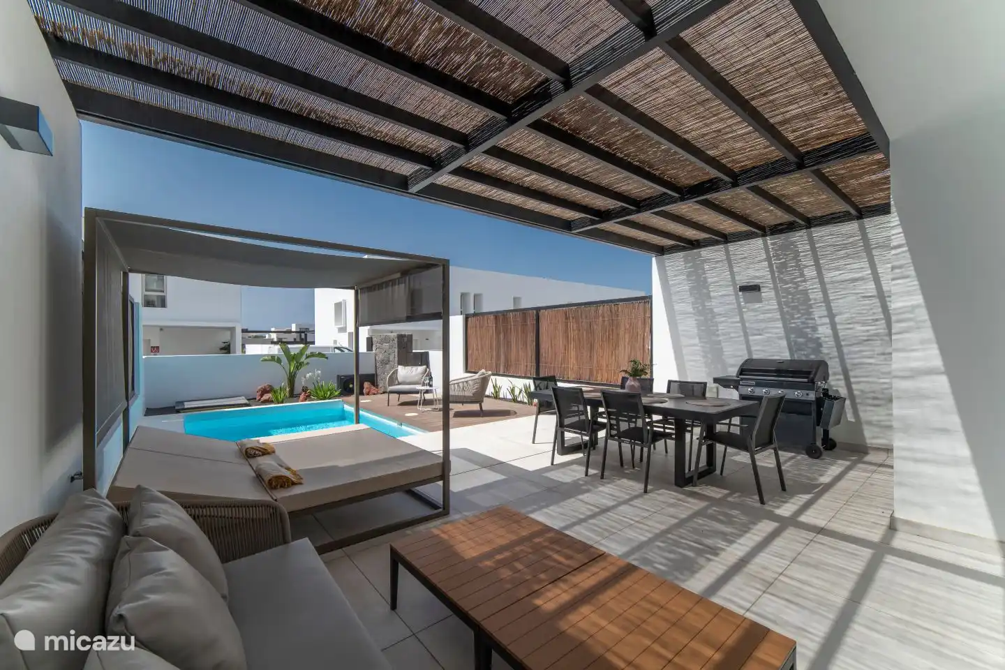 With a lovely spacious terrace with barbecue, lounge bed, dining area, lounge area and private swimming pool