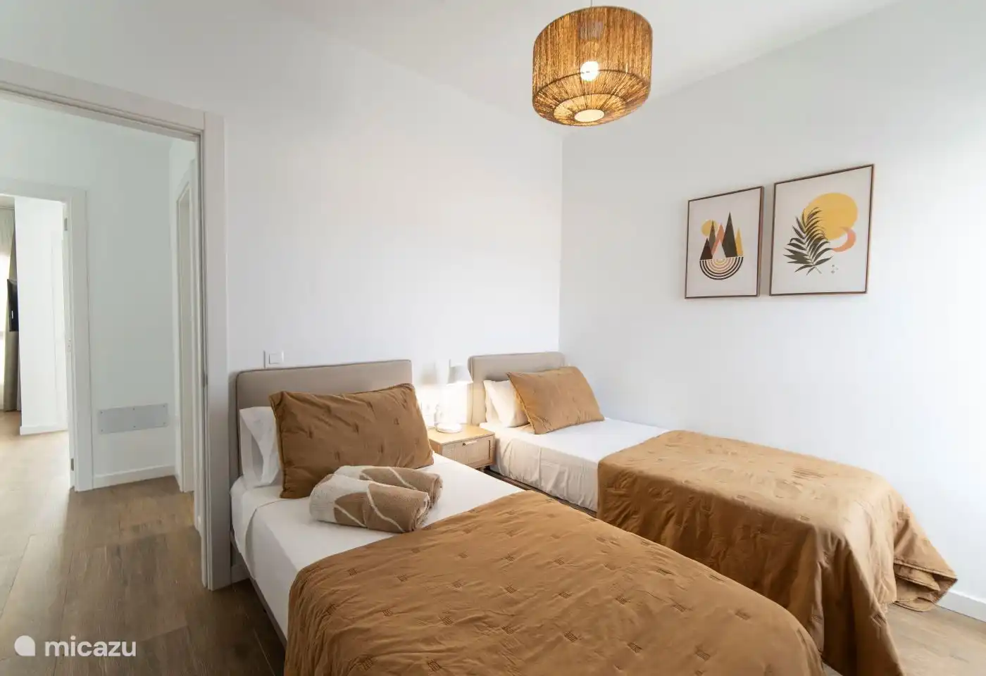 Bedroom 3 with two single beds and a view