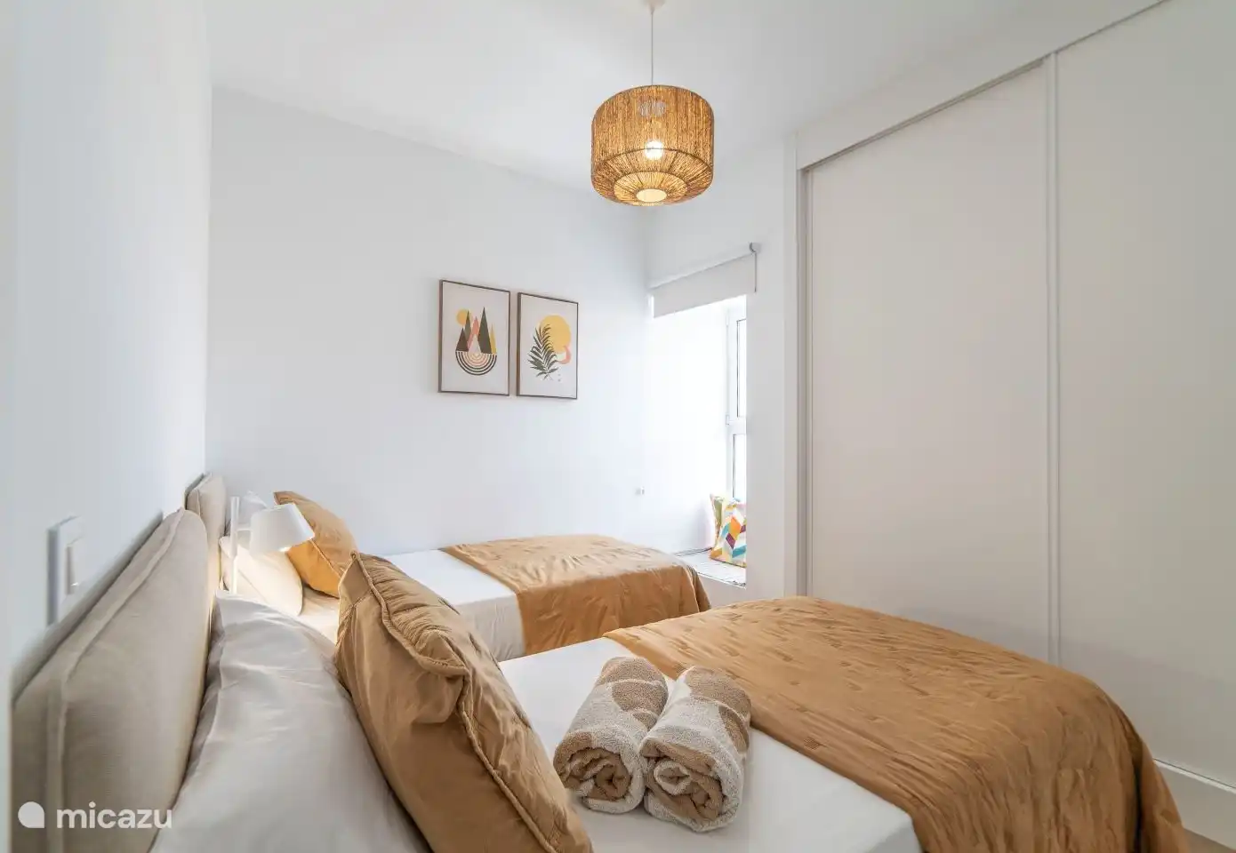 Bedroom 3 with two single beds and a view