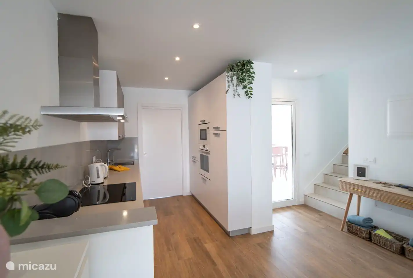 Toaster, kettle, Dolce Gusto coffee machine, oven, microwave, hob, fridge, freezer, dishwasher and plenty of pans, glasses, plates and cutlery.
In the utility room is the washing machine.