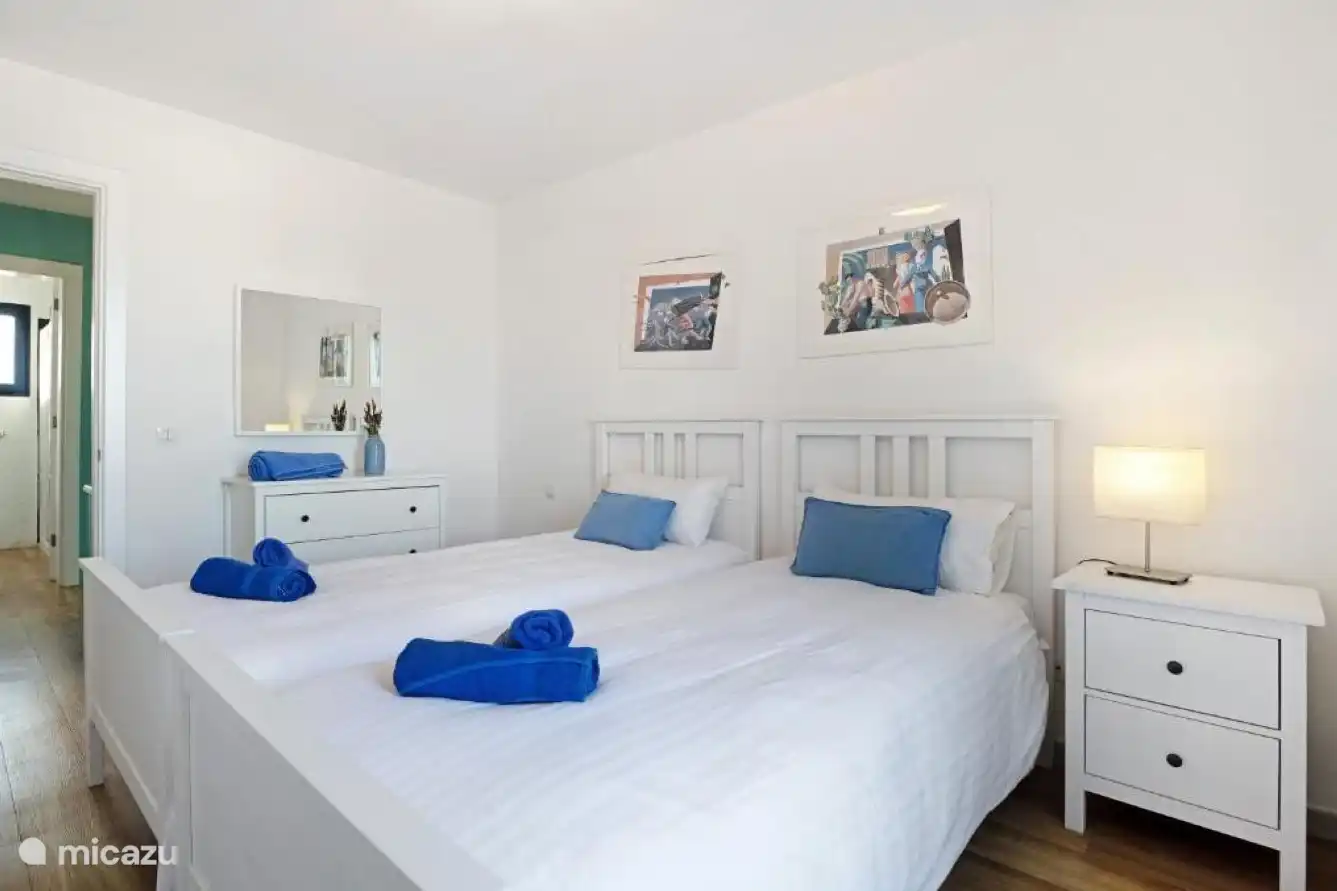 Bedroom 2 with two single beds