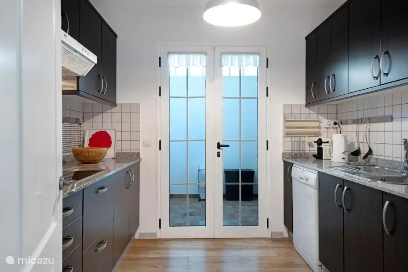 Casa Sierra&#39;s kitchen is equipped with a refrigerator, oven, microwave, toaster, kettle, coffee maker, dishwasher, Nespresso, plenty of kitchen utensils 