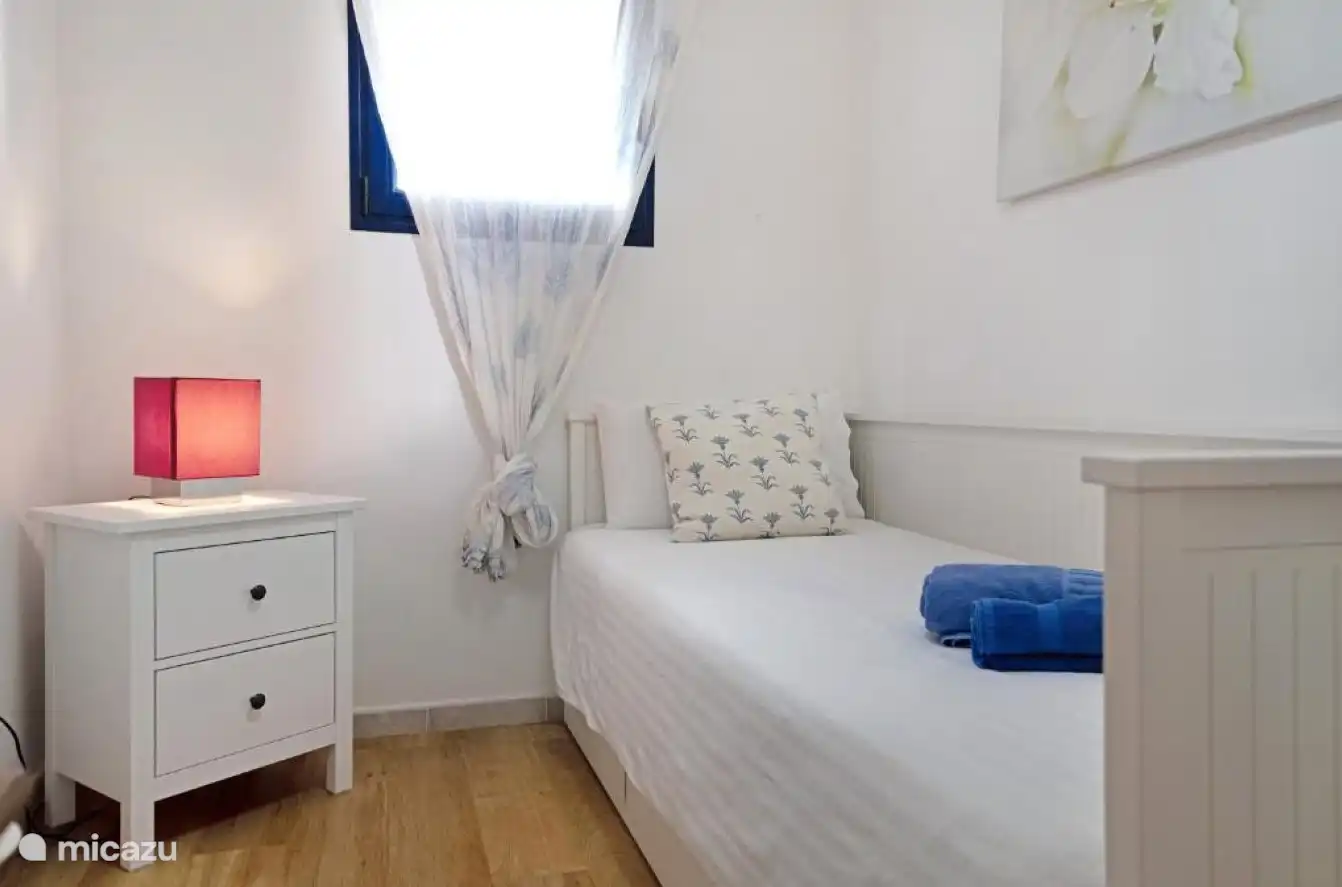 Bedroom 3 with a single bed on the ground floor