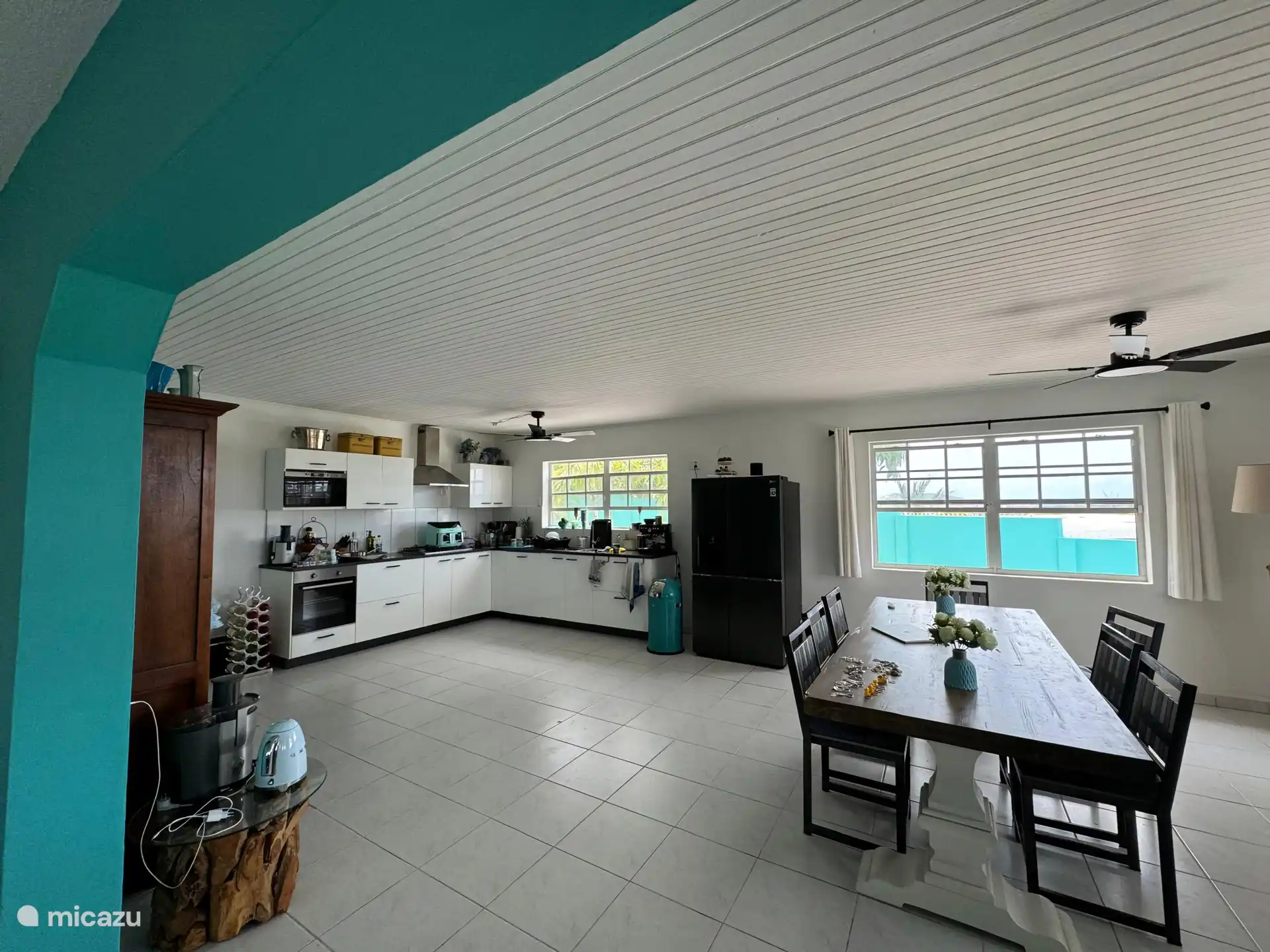 Spacious kitchen and dining room with all the appliances you need. Large dining table with 8 chairs.