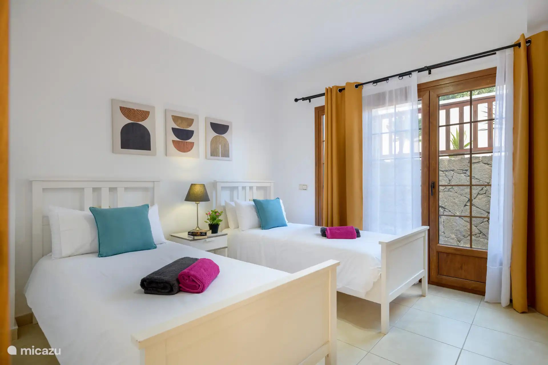 Bedroom 3 in the basement with two single beds