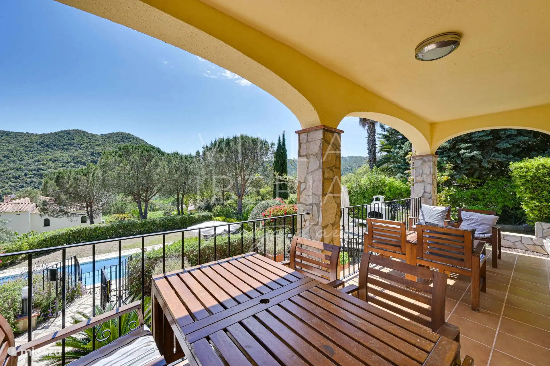 From the terrace there is a view of the swimming pool