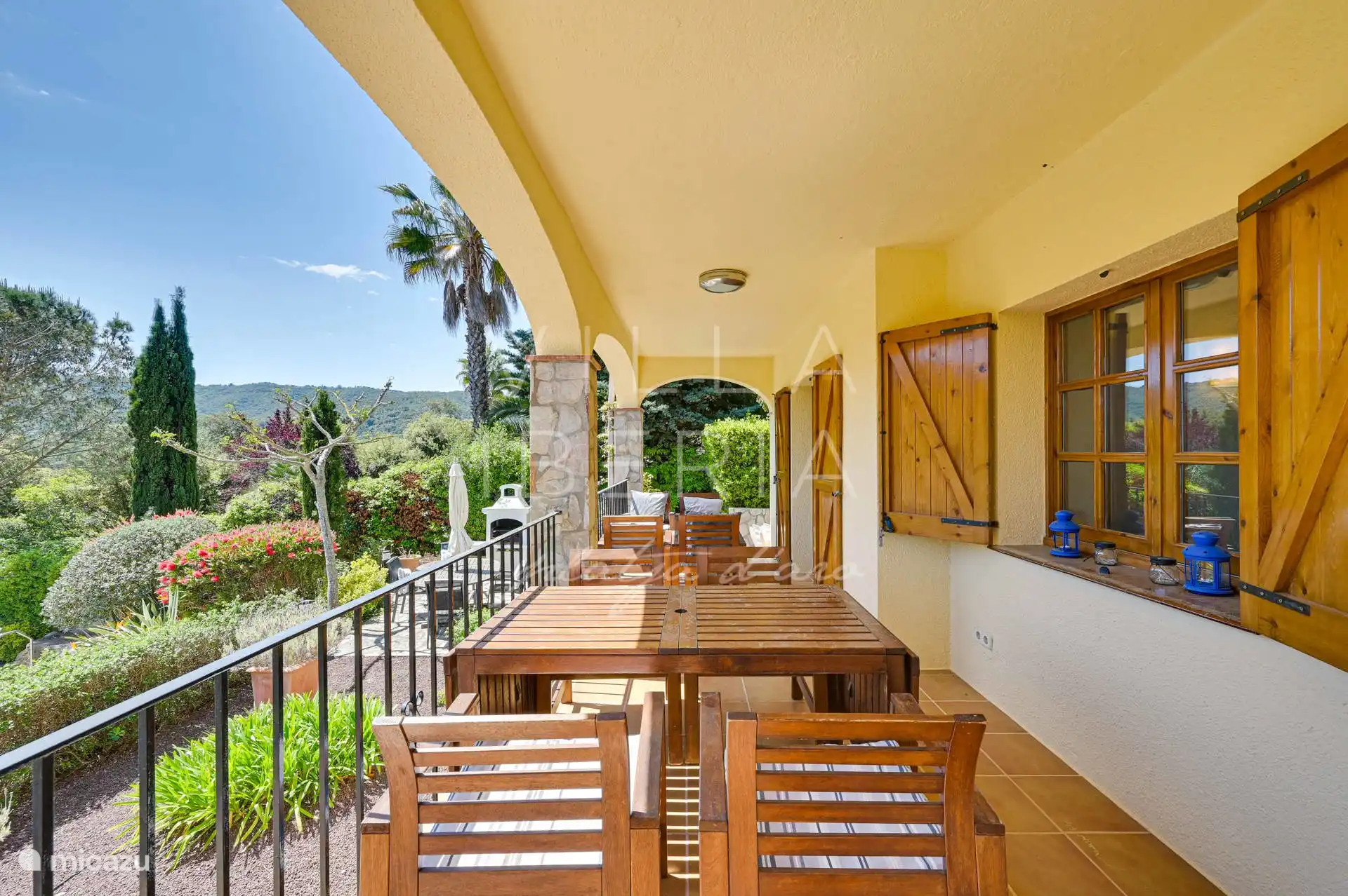 There is a covered terrace along the entire length of the villa
