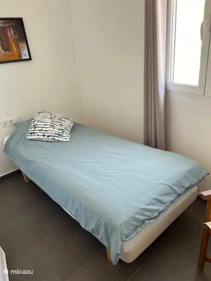 Schlafzimmer mit 2 Betten.