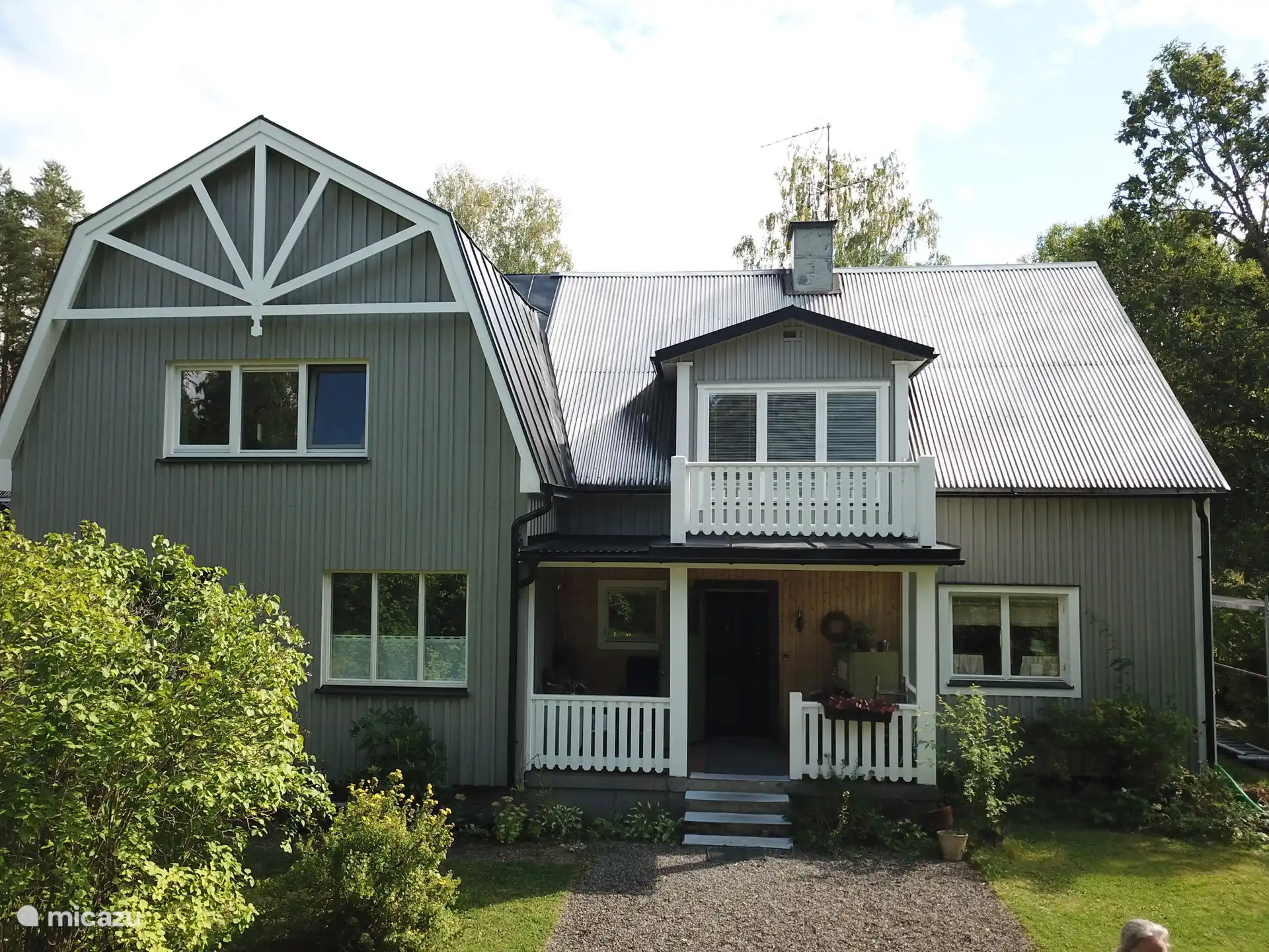 The farmhouse with the apartment on the left