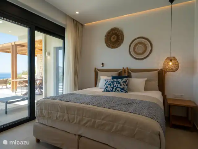 Villa Gian Maria en Grecia, Creta, Mariou - villa El dormitorio con puertas correderas a la terraza
