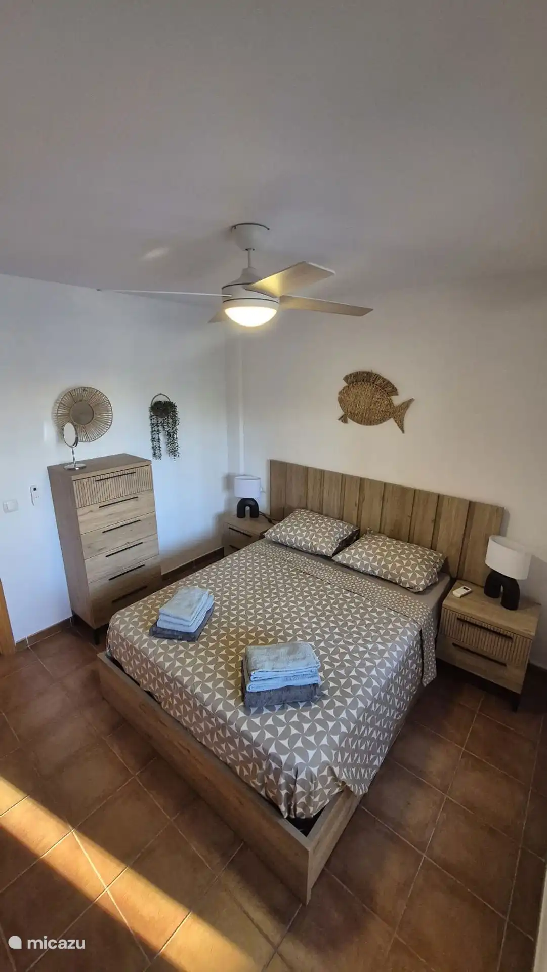 Bedroom 1 with 1x double bed and air conditioning