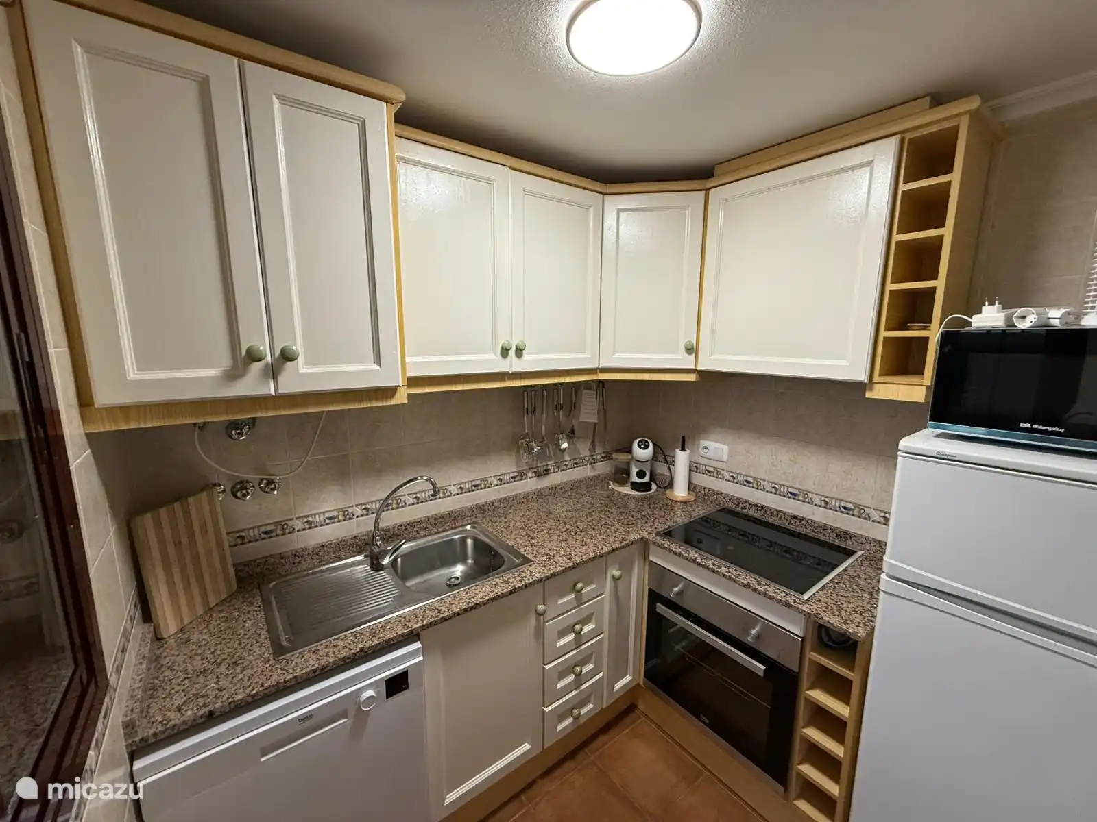 Kitchen with :
Dishwasher
Coffee machine 
Oven
Microwave