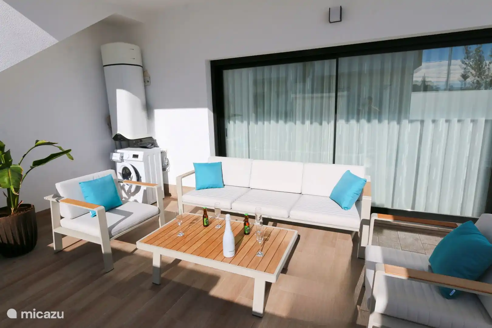 Comfortable lounge area in front of the house.