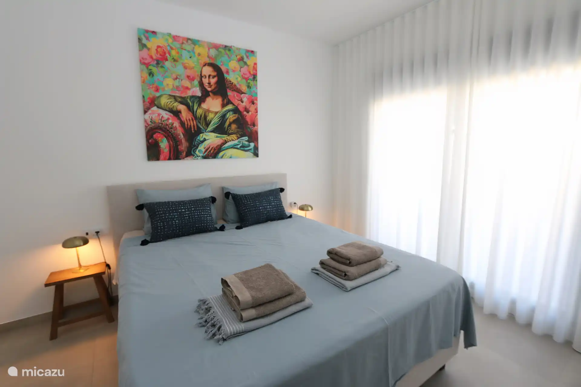 Master bedroom with extra long and comfortable box spring double bed. Size of the bed is 210 x 180