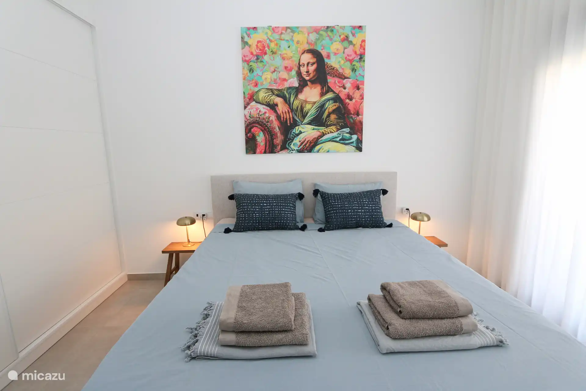 Master bedroom with extra long and comfortable box spring double bed. Size of the bed is 210 x 180