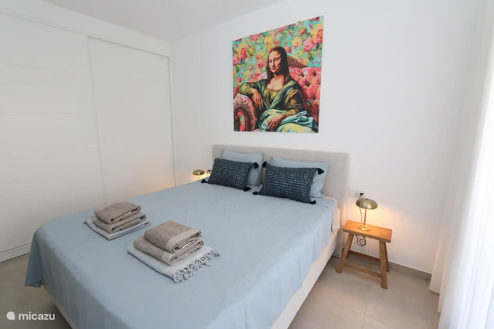 Master bedroom with extra long and comfortable box spring double bed. Size of the bed is 210 x 180