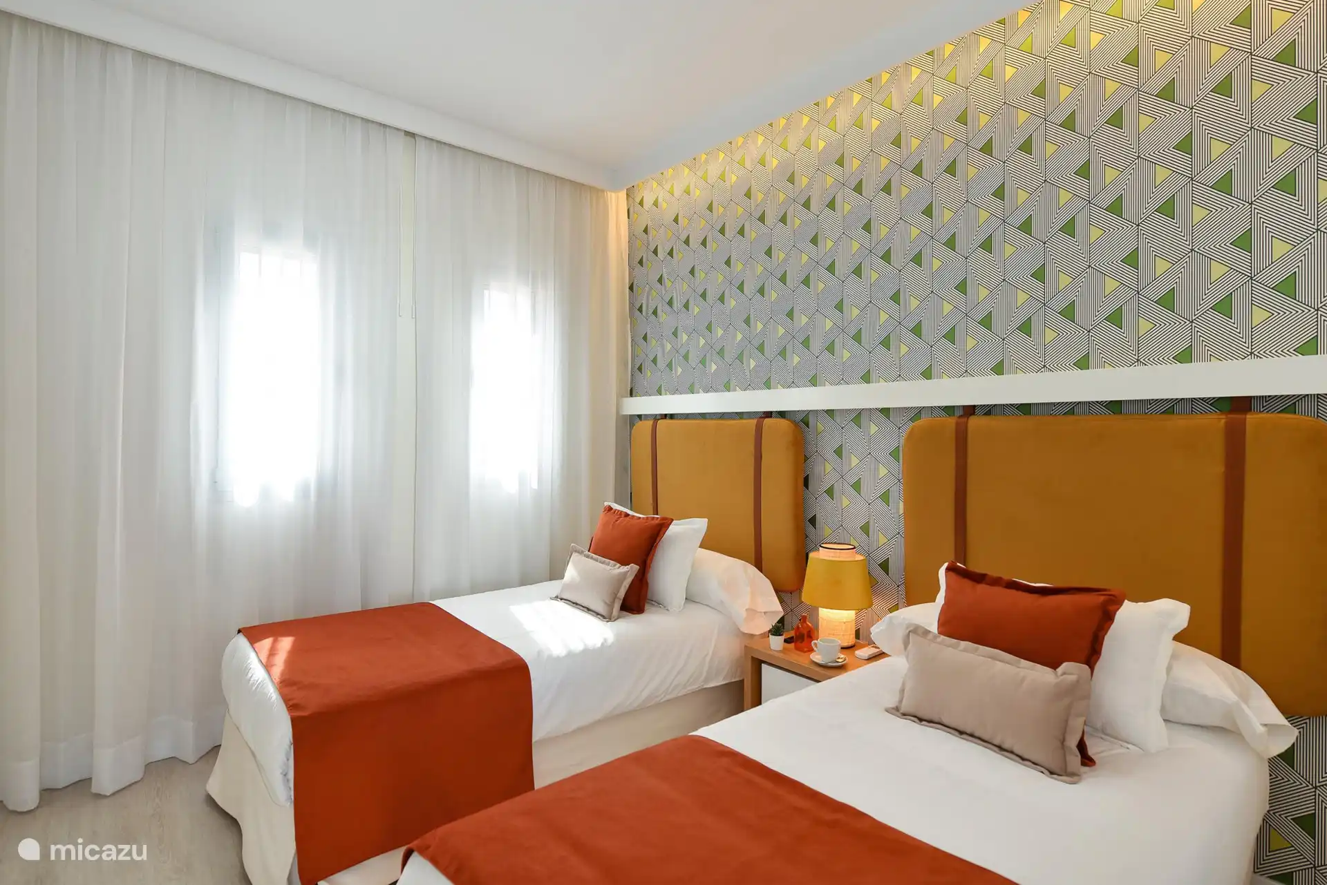 Chambre avec deux lits simples