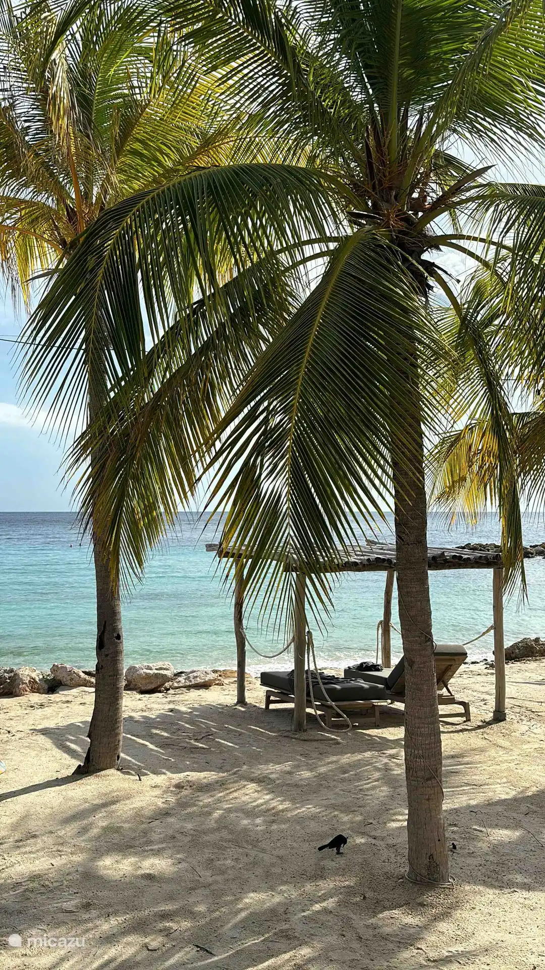 Het prachtige strand van Blue Bay