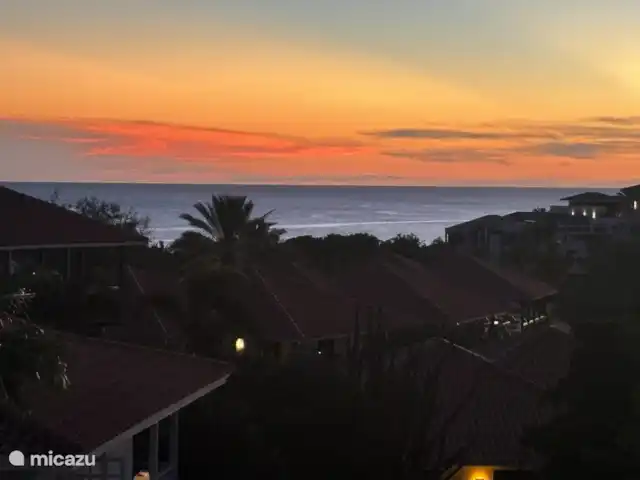 Location de Vacances Curaçao, Curaçao-Centre, Sint Michiel, appartement - Blue Bay Triple Arbre 'La Colline' Du balcon, vous pourrez profiter du soleil couchant.