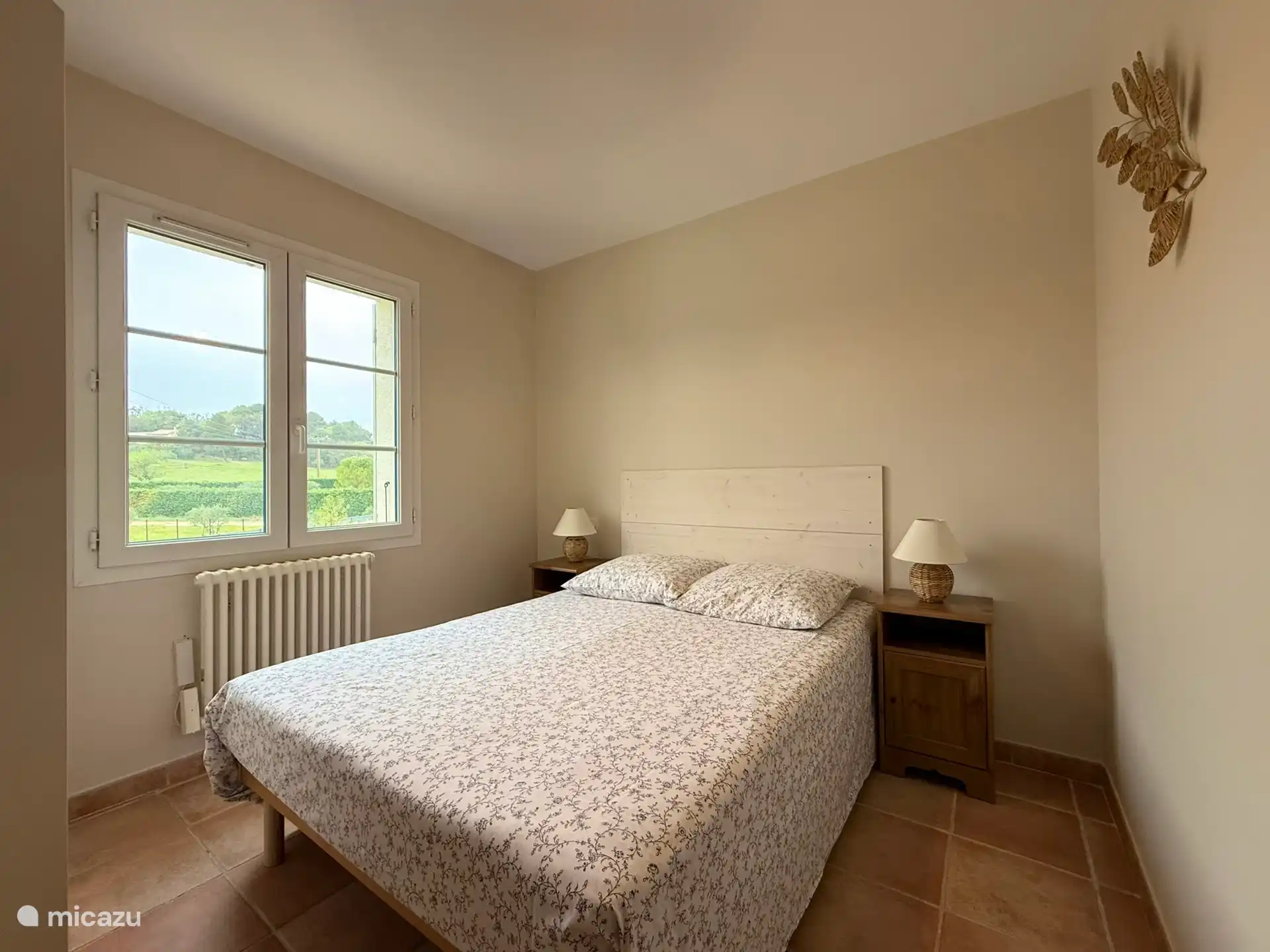 Schlafzimmer 3 im Obergeschoss mit einem 140 cm Bett.