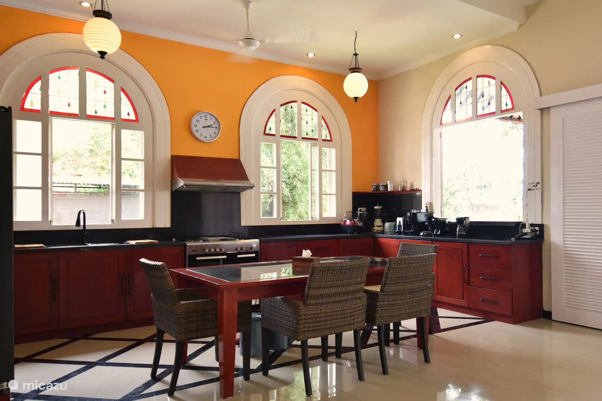 indoor kitchen and indoor dining area