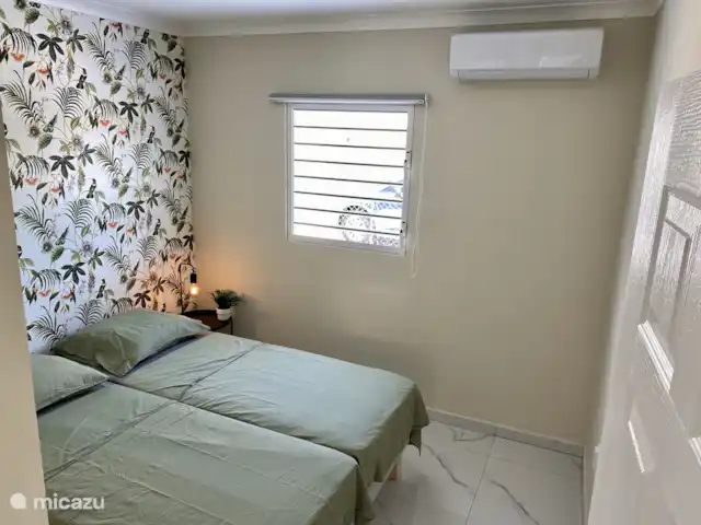 Kas Son i Mar met prive zwembad huren in Curaçao, Banda Abou (west), Fontein - villa Slaapkamer met twee eenpersoonsbedden en airco, ideaal voor kinderen of vrienden.