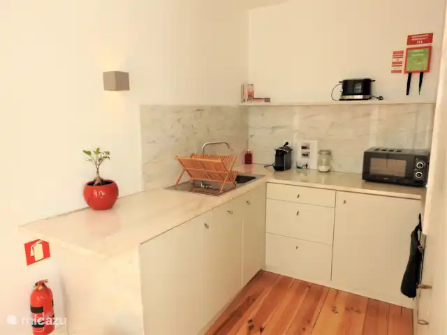 Oporto Delight Apartment 2 huren in Portugal, Porto, Porto - appartement Volledig ingerichte keuken.