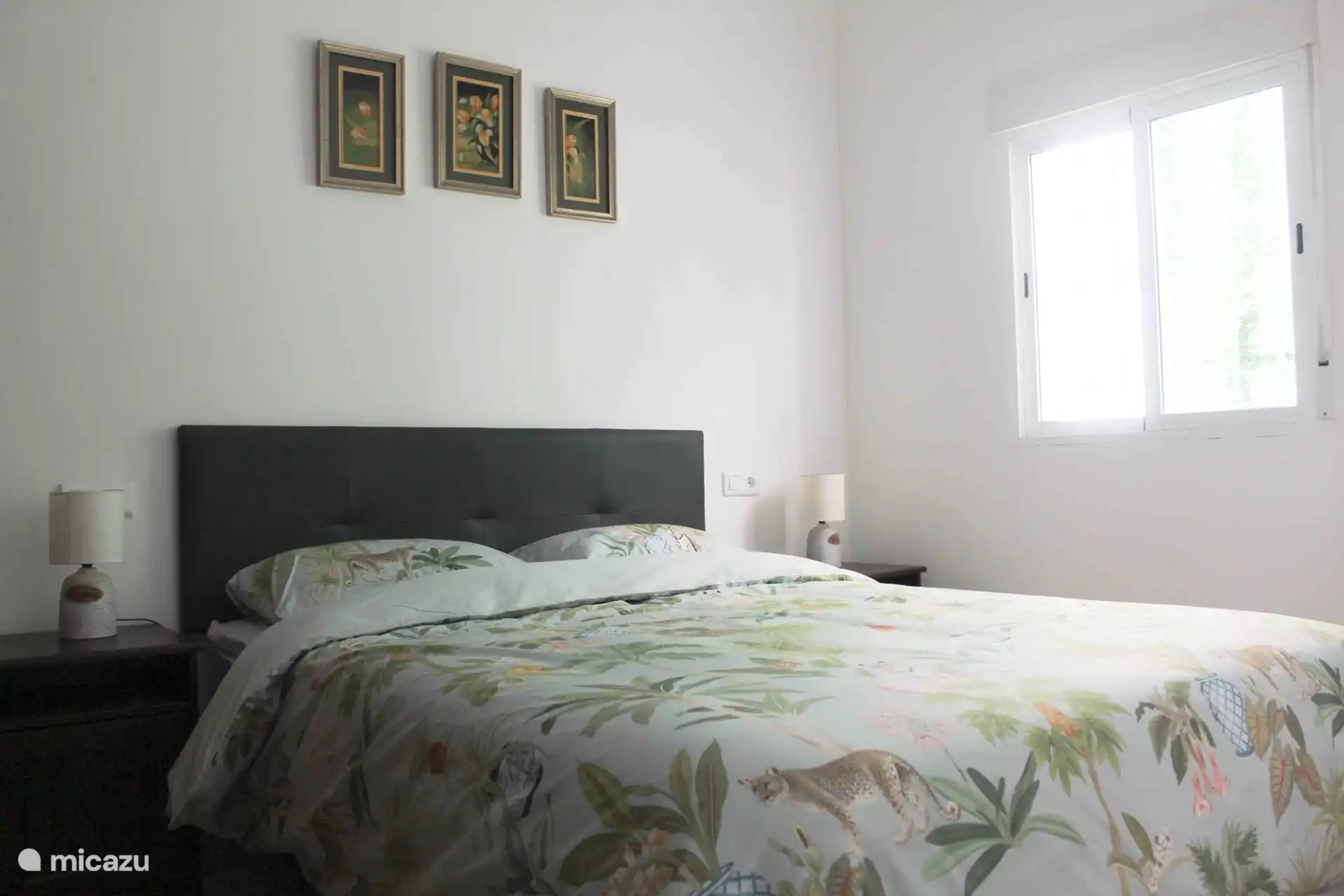 Bedroom with a double bed and wardrobe 