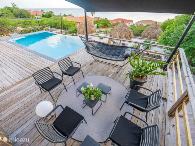 Votre propre station balnéaire privée CasAbao | Curaçao, Banda Abou (ouest), Cas Abao - villa coin salon avec hamac Fatboy