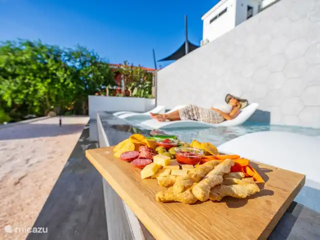 Votre propre station balnéaire privée CasAbao | Curaçao, Banda Abou (ouest), Cas Abao - villa Détendez-vous autour d’un verre et d’une collation