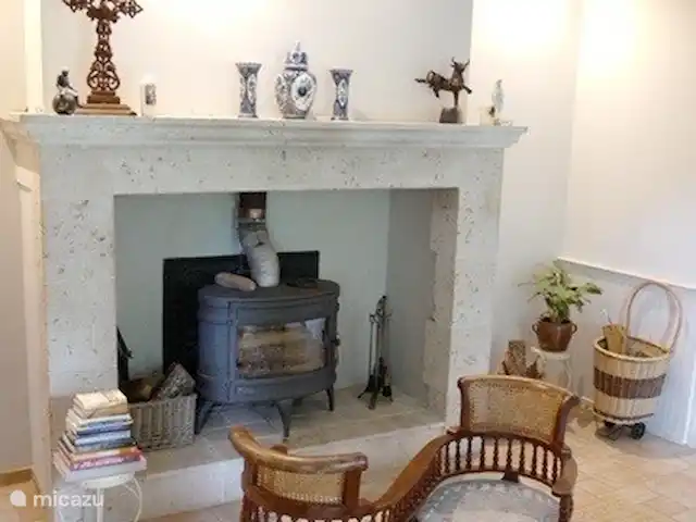 La Grande Maison de Migou | France, Tarn-et-Garonne, Larrazet - manoir / château Le salon avec cheminée et sièges.
