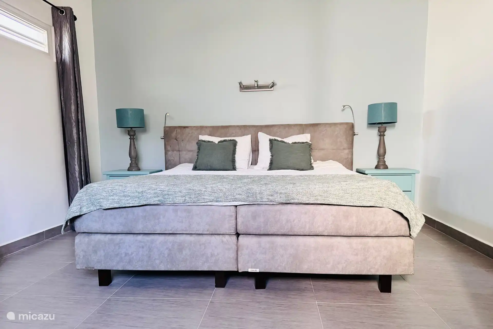 The bed is super king size! 2m x 2m