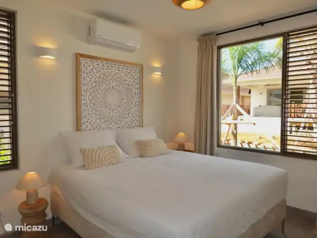 Location de Vacances Curaçao, Curaçao-Centre, Blue Bay, villa - Villa Jazmyn 26@Blue Bay Curaçao Chambre au rez-de-chaussée avec lit double