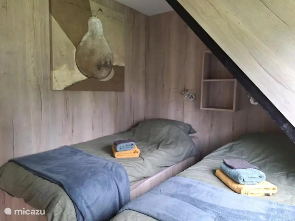 Hauptschlafzimmer, in dem Sie wählen können, ob die Betten gegeneinander oder getrennt stehen.