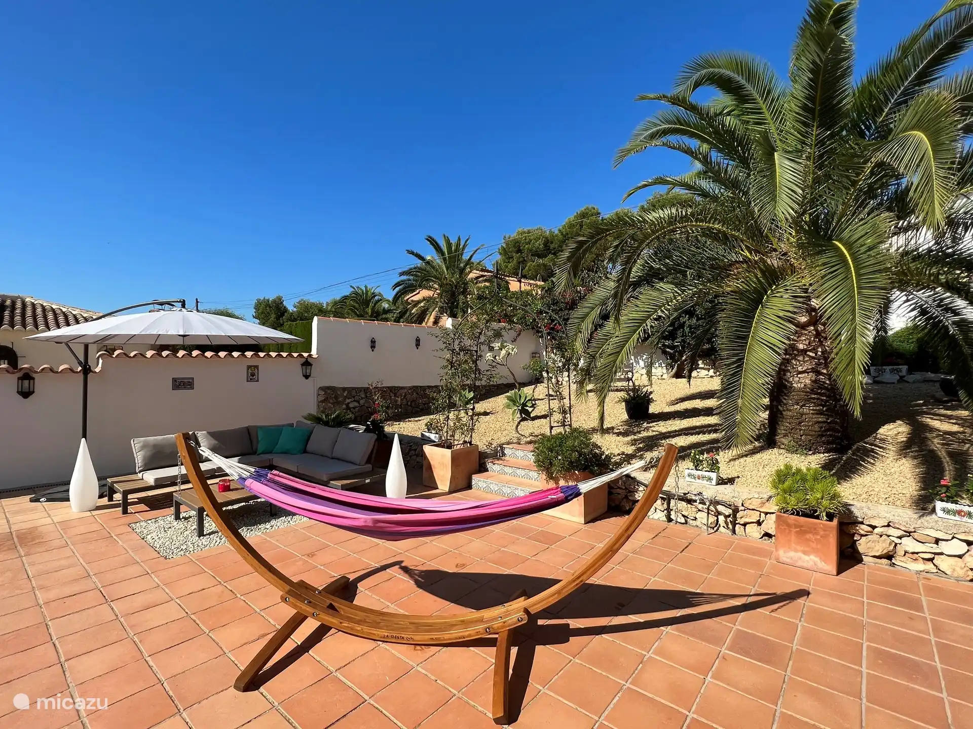 Terrasse extérieure avec hamac