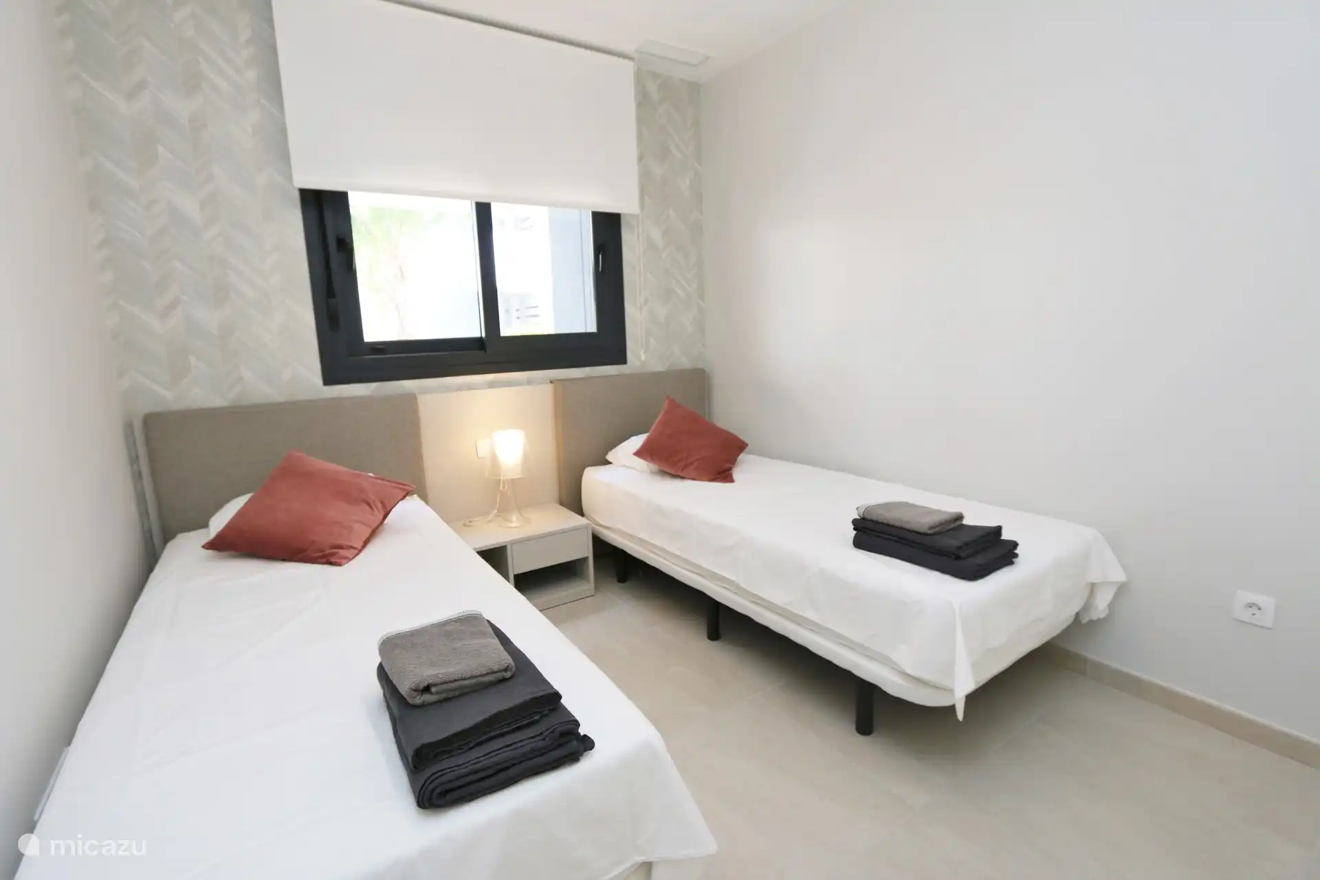 Chambre avec deux lits simples