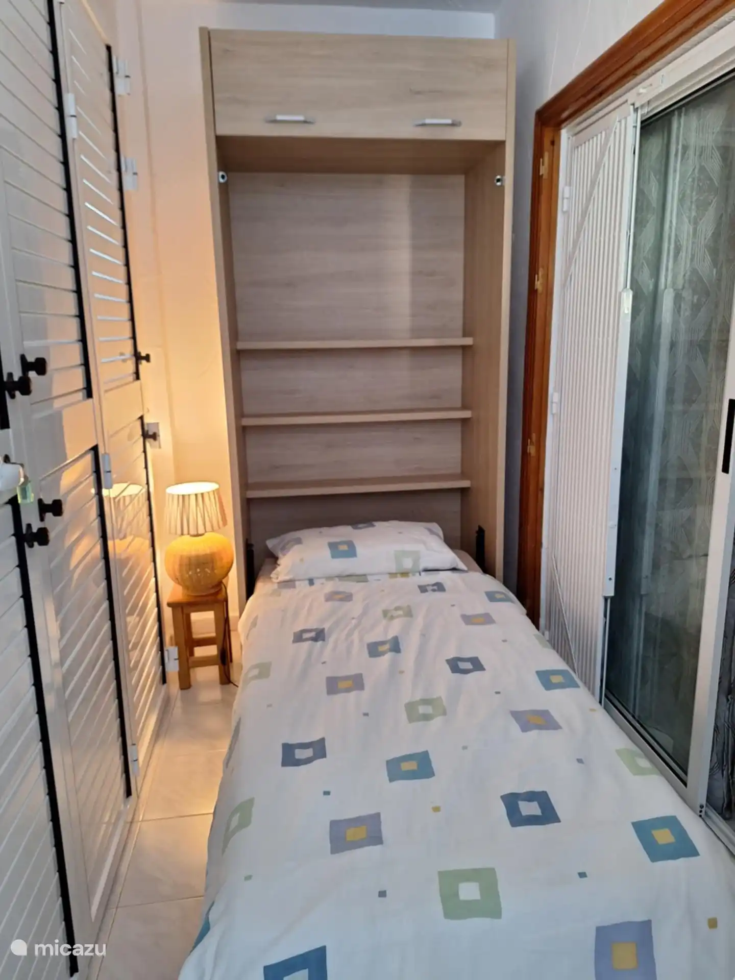 Veranda, die in ein Schlafzimmer mit 1 Bett umgewandelt wurde