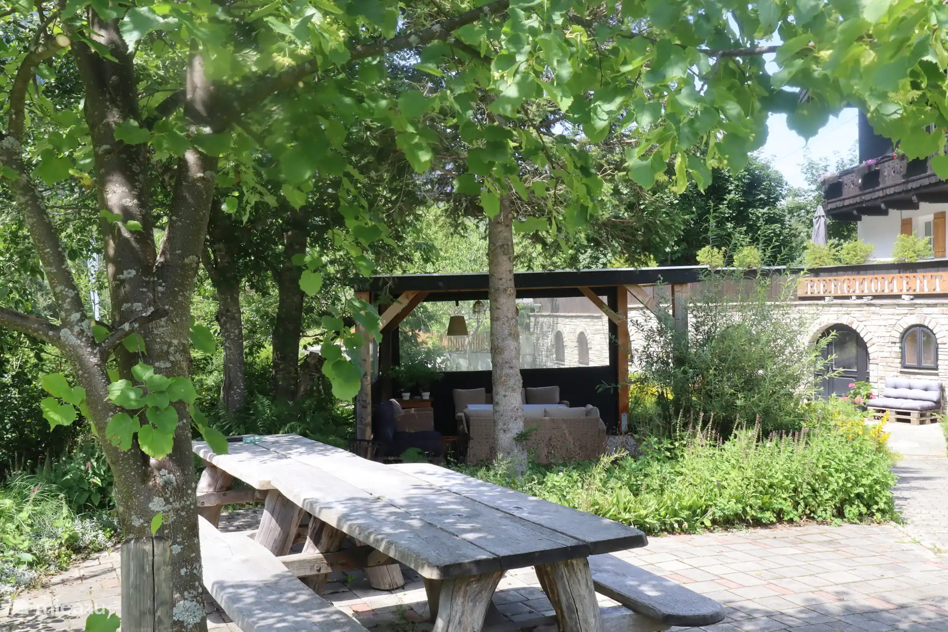 Garden with veranda and various seating areas