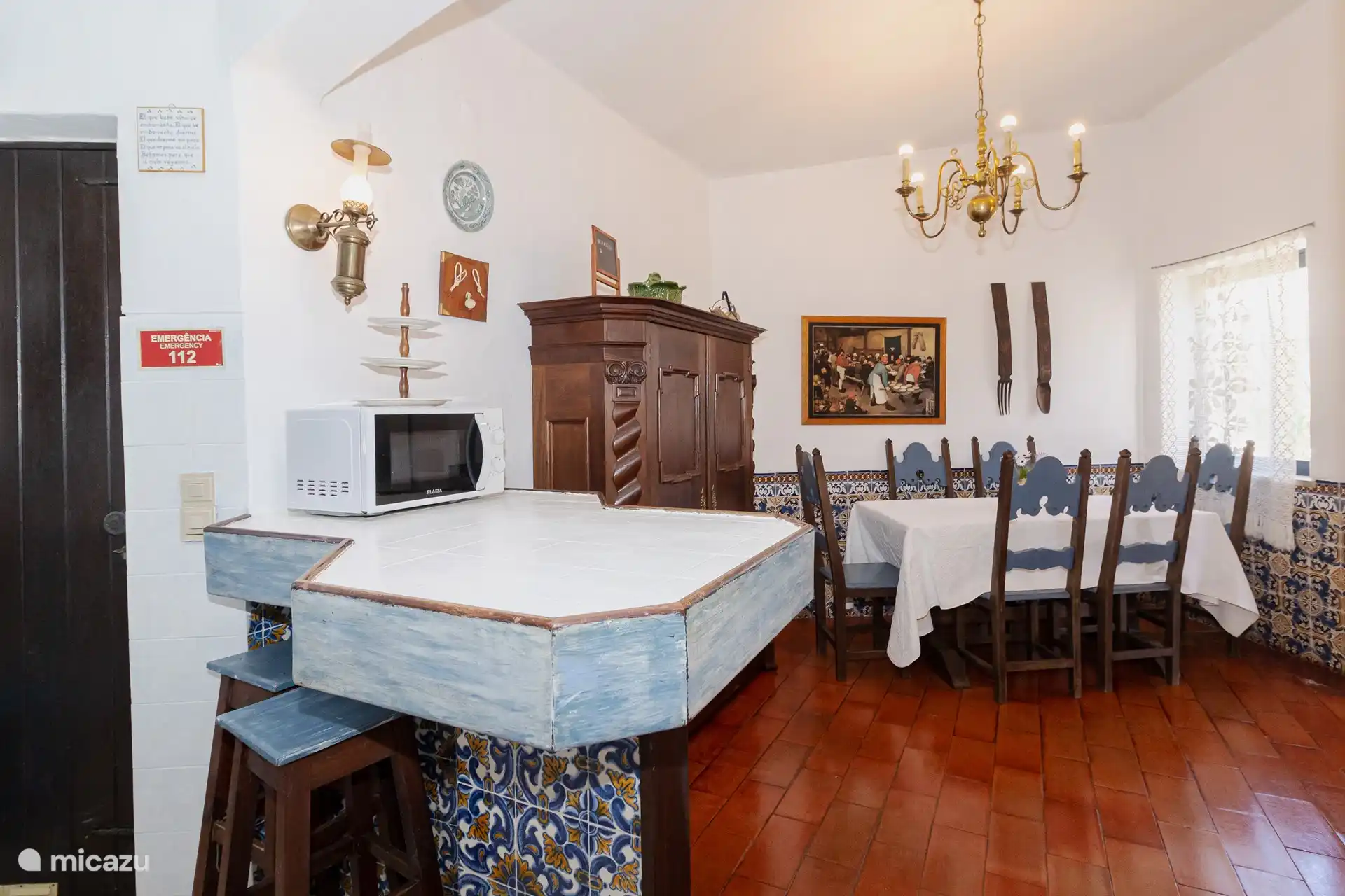 Dining area and entrance to the kitchen.  