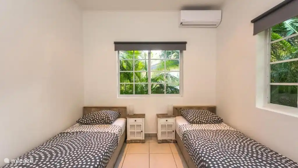 2 single beds can also be joined together to form a bed