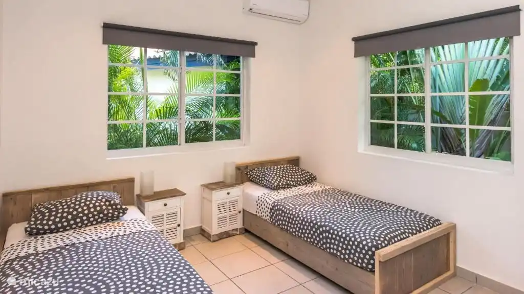 2 single beds can also be joined together to form a bed