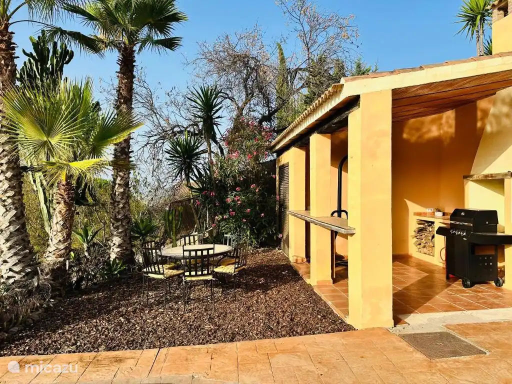 Salon barbecue avec coin salon