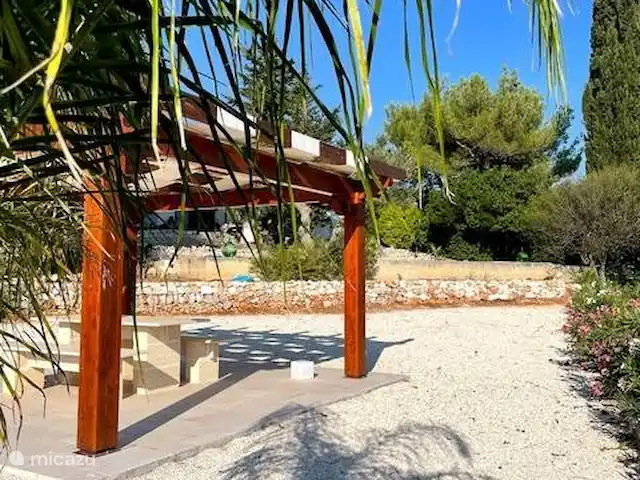 Antiguo Trullo Casa Lucca en Italia, Apulia, Carovigno - casa vacacional Pérgola de asientos